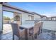 A roof top patio with outdoor dining table and chairs and a built-in kitchen area at 1199 Huff Nw Rd # 112, Atlanta, GA 30318