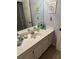 Bright bathroom featuring a single vanity and lots of counter space at 3962 Fox Glen Dr, Woodstock, GA 30189