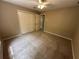 Carpeted bedroom with closet space and a ceiling fan at 3962 Fox Glen Dr, Woodstock, GA 30189