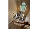 Traditional home featuring a staircase leading to the foyer below with large windows at 3962 Fox Glen Dr, Woodstock, GA 30189