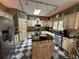 Updated kitchen with stainless steel appliances, a center island, and custom cabinets at 3962 Fox Glen Dr, Woodstock, GA 30189