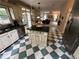 Well-appointed kitchen with island and seamless flow into the adjacent living spaces at 3962 Fox Glen Dr, Woodstock, GA 30189