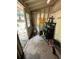 Small storage room with tools, shelves, and a lawnmower next to an open door at 3962 Fox Glen Dr, Woodstock, GA 30189