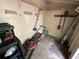 Small storage room with tools, shelves, and a lawnmower at 3962 Fox Glen Dr, Woodstock, GA 30189