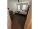 Bedroom with light gray walls, ceiling fan, and a comfortable bed at 495 Sterling Creek Way, Loganville, GA 30052