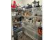 Organized walk-in pantry with wire shelving, perfect for ample storage and easy access to kitchen staples at 495 Sterling Creek Way, Loganville, GA 30052