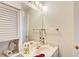 Bathroom featuring a sink with storage space, great lighting, and a mirror at 652 Trailwood Sw Ln, Marietta, GA 30064