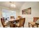 Dining area next to a sunroom with lots of natural light at 652 Trailwood Sw Ln, Marietta, GA 30064