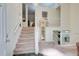 Spacious entryway featuring staircase and grandfather clock at 652 Trailwood Sw Ln, Marietta, GA 30064