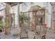 Private patio featuring a pea gravel surface and a fenced enclosure with growing greenery at 1661 La France Stret Ne, Unit #216, Atlanta, GA 30307