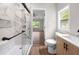 Bathroom featuring a glass-enclosed shower and a new vanity, offering a clean and modern look at 6402 Kensington Ct, Austell, GA 30106