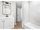 Bright bathroom with modern fixtures, a new vanity, and a shower featuring beautiful tile work at 6402 Kensington Ct, Austell, GA 30106