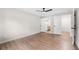 Spacious bedroom featuring wood-look floors and multiple doors leading to other rooms at 6402 Kensington Ct, Austell, GA 30106