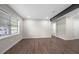 Bright living area featuring hardwood floors, modern recessed lighting, and natural light at 6402 Kensington Ct, Austell, GA 30106