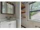 Small bathroom features a white vanity and a medicine cabinet at 1352 Overlook Se Cv, Smyrna, GA 30080