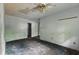 An empty bedroom showing a ceiling fan and doorway to a closet at 1352 Overlook Se Cv, Smyrna, GA 30080