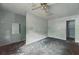 An empty bedroom showing a doorway to a closet and a mirror at 1352 Overlook Se Cv, Smyrna, GA 30080