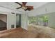 Large living room with high ceiling and sliding glass doors to a deck at 1352 Overlook Se Cv, Smyrna, GA 30080