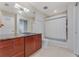Bathroom featuring a granite vanity, toilet, and shower at 3325 Piedmont Rd Ne # 1907, Atlanta, GA 30305