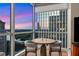 Cozy dining area showcases floor-to-ceiling windows and city views at 3325 Piedmont Rd Ne # 1907, Atlanta, GA 30305