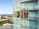 Exterior view of condos with balconies, floor to ceiling windows, and skyline view at 3325 Piedmont Rd Ne # 1907, Atlanta, GA 30305
