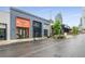 Commercial building exteriors, featuring Smoothie King, Alloy, Waxing the City, and other storefronts on a wet day at 3325 Piedmont Rd Ne # 1907, Atlanta, GA 30305