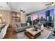 Bright living room features floor to ceiling windows and lovely skyline views at 3325 Piedmont Rd Ne # 1907, Atlanta, GA 30305