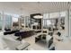 Bright lounge featuring comfortable seating, marble fireplace and floor-to-ceiling city views at 3325 Piedmont Rd Ne # 1907, Atlanta, GA 30305