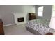 Bedroom featuring a fireplace and view to backyard at 3875 Wintergreen Ct, Marietta, GA 30062