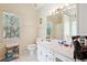 Bright bathroom with a large vanity, ample counter space, and neutral tones at 408 Victoria Place Dr, Locust Grove, GA 30248
