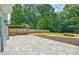 New backyard featuring large patio and freshly seeded grass at 1950 Stethem Fry, Alpharetta, GA 30022