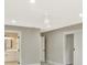 Bedroom with ensuite bathroom, neutral paint, and ceiling fan at 1950 Stethem Fry, Alpharetta, GA 30022