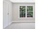 Bedroom featuring a large window offering ample natural light at 1950 Stethem Fry, Alpharetta, GA 30022