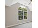 Bedroom with vaulted ceiling, fan, and large arched window at 1950 Stethem Fry, Alpharetta, GA 30022