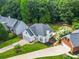 A charming, well-maintained single-story home with lush landscaping and a neatly manicured lawn at 1950 Stethem Fry, Alpharetta, GA 30022