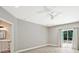 Open and airy main bedroom features recessed lights and sliding glass doors at 1950 Stethem Fry, Alpharetta, GA 30022