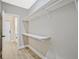 Spacious walk-in closet features shelving and hanging rods for optimal storage at 1950 Stethem Fry, Alpharetta, GA 30022