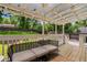 Relaxing covered back porch with comfortable seating, perfect for outdoor enjoyment and shaded relaxation at 2119 Glenwood Se Ave, Atlanta, GA 30316
