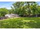 Large, beautifully maintained backyard featuring a lush lawn, mature trees, perfect for outdoor activities at 2119 Glenwood Se Ave, Atlanta, GA 30316