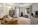 Bright, multi-purpose room as bedroom/office including a futon, bookshelves and lots of natural light at 2119 Glenwood Se Ave, Atlanta, GA 30316