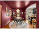 Dining room adjacent to kitchen featuring hardwood floors, modern lighting and stylish decor at 2119 Glenwood Se Ave, Atlanta, GA 30316