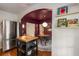 Bright kitchen boasts butcher block island, stainless refrigerator, and charming dining area for cozy meals at 2119 Glenwood Se Ave, Atlanta, GA 30316