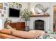 Living room showcasing a fireplace, hardwood floors, and contemporary decor at 2119 Glenwood Se Ave, Atlanta, GA 30316