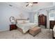 This is a bedroom with carpet flooring, a queen sized bed and multiple chests of drawers at 2192 Nine Oaks Nw Dr, Kennesaw, GA 30152