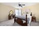 Serene bedroom features neutral decor, a vintage vanity, and soft lighting creating a relaxing atmosphere at 2192 Nine Oaks Nw Dr, Kennesaw, GA 30152
