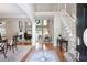 Bright foyer features hardwood floors, staircase, and views of the open living spaces at 2192 Nine Oaks Nw Dr, Kennesaw, GA 30152