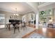 Open concept living area boasts high ceilings, large windows, and elegant furnishings at 2192 Nine Oaks Nw Dr, Kennesaw, GA 30152