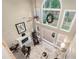 Bright living room with fireplace, large windows, and vaulted ceilings providing views of the backyard at 2192 Nine Oaks Nw Dr, Kennesaw, GA 30152