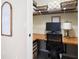 This is a small in home office space with built in shelves and desktop workstation area at 2192 Nine Oaks Nw Dr, Kennesaw, GA 30152