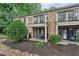 Townhome exterior featuring a patio and balcony, perfect for outdoor living and relaxation at 3650 Ashford Dunwoody Ne Rd # 811, Atlanta, GA 30319
